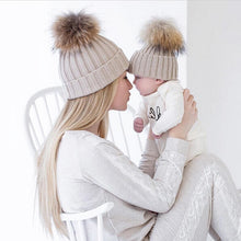 Load image into Gallery viewer, Matching PomPom Hat for kids and adults fashion